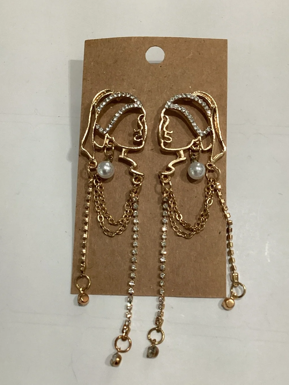 Gold Face Outline Drop Earrings with Pearl and Chain Accents